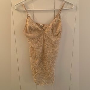 Delicate cream colored lacey Wilfred tank top from Aritzia